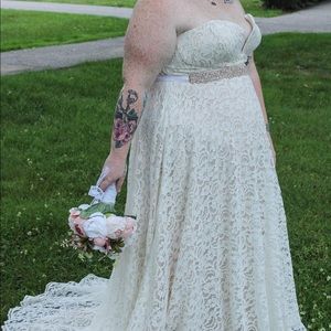 Size 20 wedding dress and rose gold belt. Worn once for 2 hours